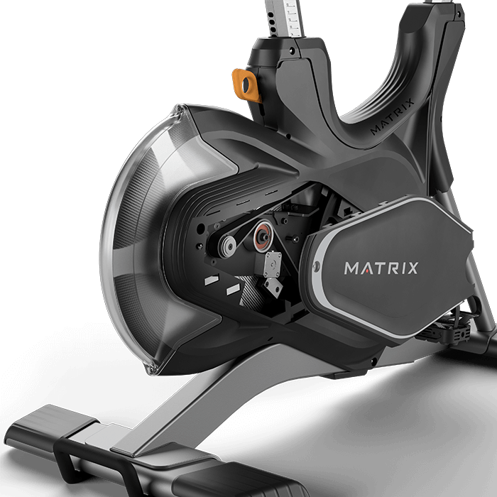Close up of flywheel and pedals for the Matrix Fitness CXV Virtual Bike