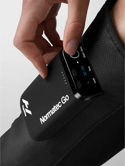 Close up of a person using the Normatec Go by Hyperice